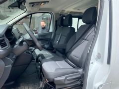 fundas polipiel del. RENAULT 2015- TRAFIC III (asts.: 2+1/ reposac.: 3/apoyab.: ast. cond.)